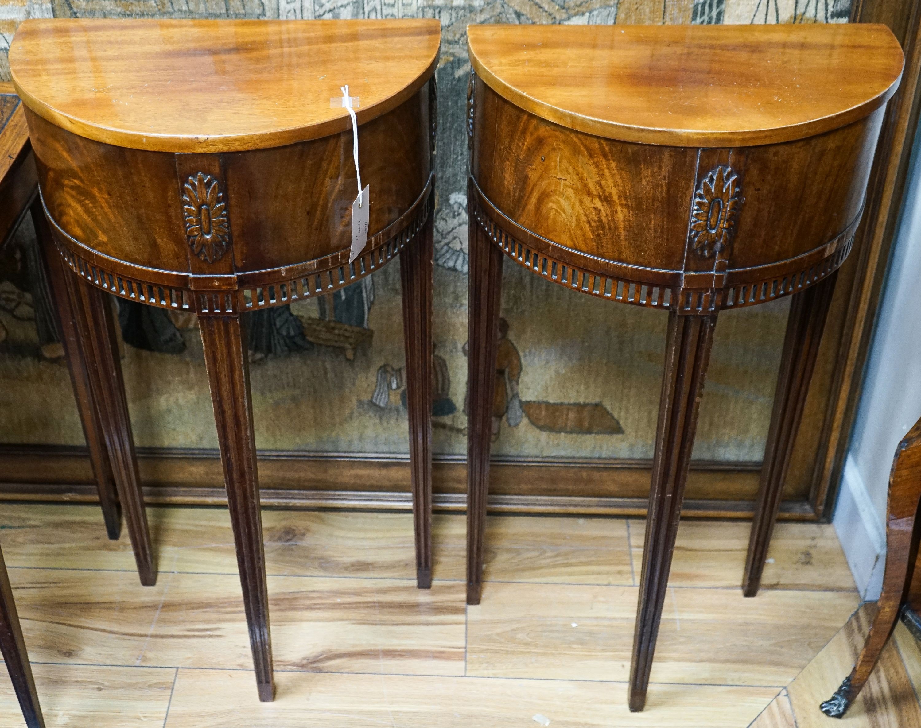 A pair of late 19th century Dutch mahogany demi lune console tables, width 42cm, depth 24cm, height 80cm
